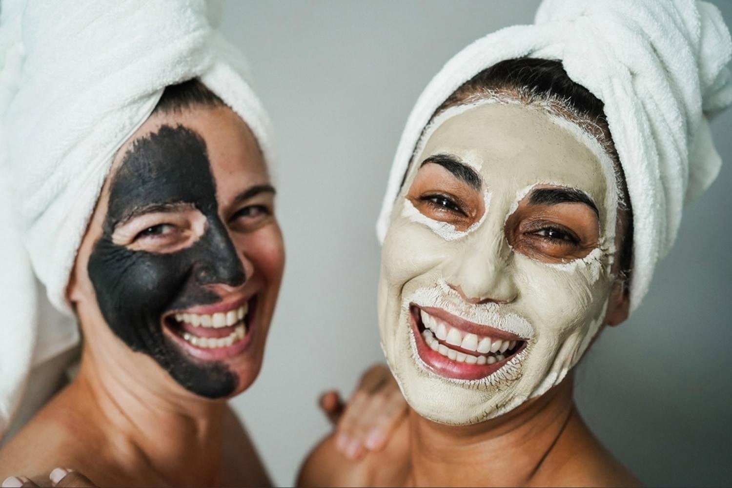 Two women wearing clay masks during a salon skin recovery treatment in Dubai